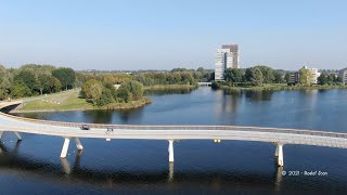 De Weerwaterbrug  een 240 meter lange overspanning verbindt  Lumièrepark met  Floriadewijk in Almere