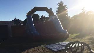 Fat man front flips on large bouncy castle !!!!MUST WATCH