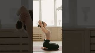 a beautiful girl is doing yoga