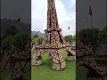 റോസാ പൂക്കൾ കൊണ്ട് നിർമ്മിച്ച ഈഫൽ ടവർ eiffel tower model made of rose flowers rose garden ooty.