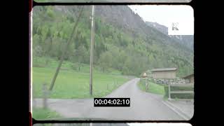 1990s Switzerland, POV Driving Through Alpine Village, 16mm