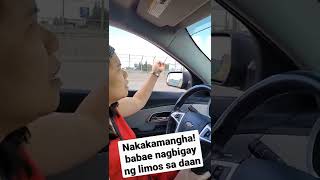 Nakakamamgha! Babae nagbigay ng limos sa daan