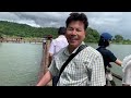 Thararak Waterfall,Tak Province, Thailand 🇹🇭.  Koean mission team feeding fish in the lake.