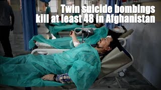 Twin suicide bombings kill at least 48 in Afghanistan