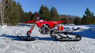 2022 Honda CRF250RX paired with a Timbersled Riot S