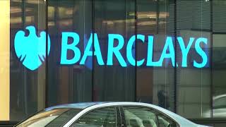 Barclays profit hit by deal slump, trading error