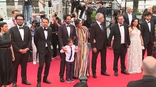 Cannes: Cast and crew of "Holy Spider" by Ali Abbasi on the red carpet | AFP