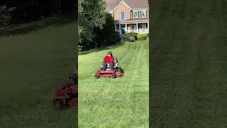 EXMARK mowing ACRES of grass