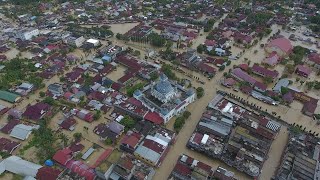 Indonesia's Sumatra island flooded, forcing thousands to flee homes | AFP