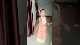 Little girl dancing in lehenga