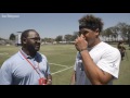 Clarence Hill goes one on one with Cowboys fullback Keith Smith