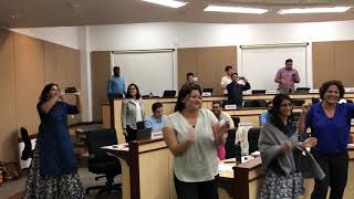 Professor Shad Morris dancing with Students at ISB