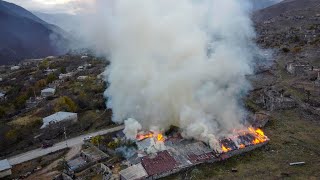 Nagorno-Karabach villagers burn down their houses before Azerbaijan handover