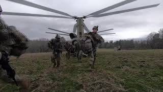 Soldiers from Bravo Company, 1-109th Infantry Regiment conduct aerial movement