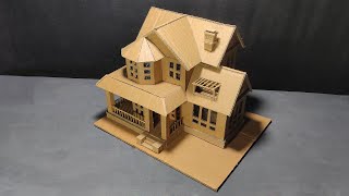 Attractive double storey house by using cardboard.
