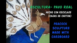 Escultura - Pavo Real hecho con reciclaje (cartones )(peacock sculpture made with cardboard)