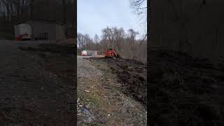 kubota svl65 moving dirt