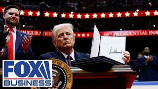 President Trump signs executive orders before supporters