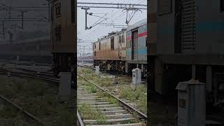 Amrit Bharat Livery CNB WAP-7 hauling 11449 Jabalpur - Katra Express meets 12920 Malwa SF Express