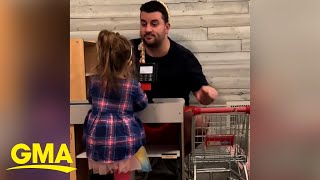 Adorable dad takes on role of sassy cashier while playing with daughter