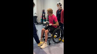 Spinal cord injury patient Konrad works on upper body strength