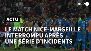 Nice-Marseille interrompu après l'envahissement du terrain par des supporters | AFP