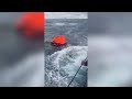 coast guard rescues 3 from life raft