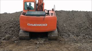 excavator climbing and decending steep gradient