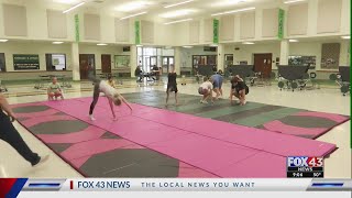 Local cheer team making history, heading to national competiton and needs your help