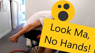 "No hands" method to adjust saddle fore-aft