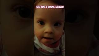 Betsy takes a break from her bottle to bounce!  #downsyndromebaby #happybaby