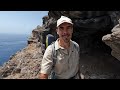 there are many caves like this here but the view of the sea from this one is particularly beautiful