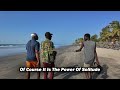 a man walking 🇬🇲 senegambia beach alone with no friends in the gambia