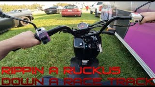 RIPPING A HONDA RUCKUS DOWN A RACE TRACK