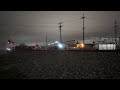 canadian pacific sd70acu 7007 leads bnsf g sweguc with a horn salute