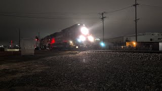 Canadian Pacific SD70ACU 7007 leads BNSF G-SWEGUC with a horn salute