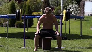 Bench press, 100-155kg to 130kg. In the garden.