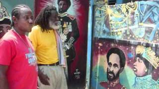 CONGOS -ASHANTI ROY - SHOWING WAYNE LONESOME THE ARTWORK ON CONGOA HQ,