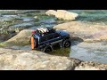 fms fcx18 toyota land cruiser lc80 climbs to the top of a waterfall injora dj crawler bumper mod