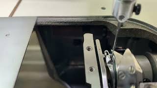 Checking the timing on a Juki DDL–8700 and hook location.