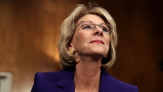 Senate panel approves Betsy DeVos nomination