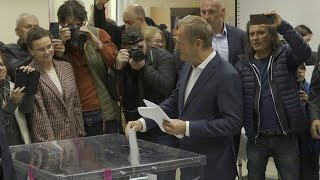 Donald Tusk votes in Poland's parliamentary elections | AFP