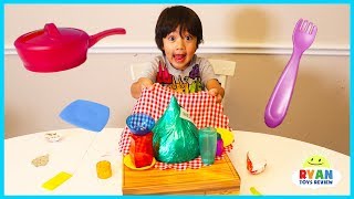 Ryan plays Crazy Cafe Board Game for kids with Egg Surprise Eggs