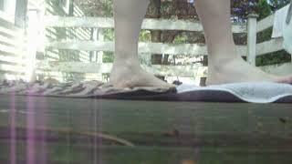 Barefoot Alicia SILENTLY walking back and forth across her deck...