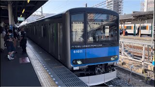 東武60000系61611編成が当駅止まりの回送電車として警笛を鳴らして春日部駅7番線を発車するシーン（2024.5.11.16:27）