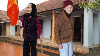 Daily life of an old couple in a riverside village in spring. Caring for veterans at the end of life