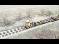 rail train in action on the iowa northern cutting and dropping of welded rail with drone views