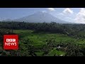 'God will tell me when to flee Bali volcano' - BBC News