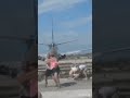 extreme jet blast blowing people away at maho beach st. maarten.