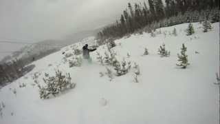 Big Sky Montana Snowboarding threw the small trees, with a bit of a crash at the end